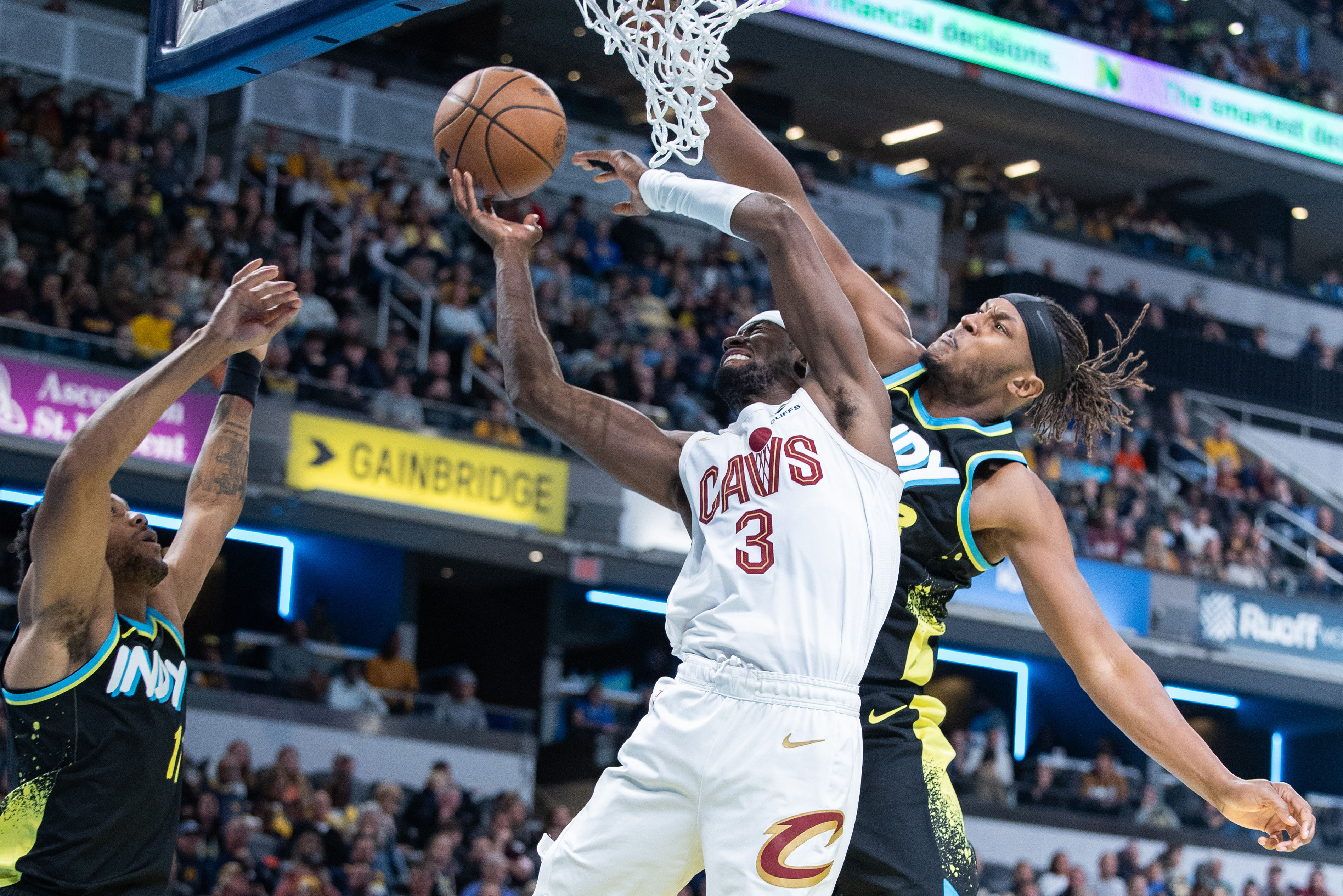 Nov 3, 2023; Indianapolis, Indiana, USA; Cleveland Cavaliers guard Caris LeVert (3) shoots the ball while Indiana Pacers center Myles Turner (33) defends in the second half at Gainbridge Fieldhouse.